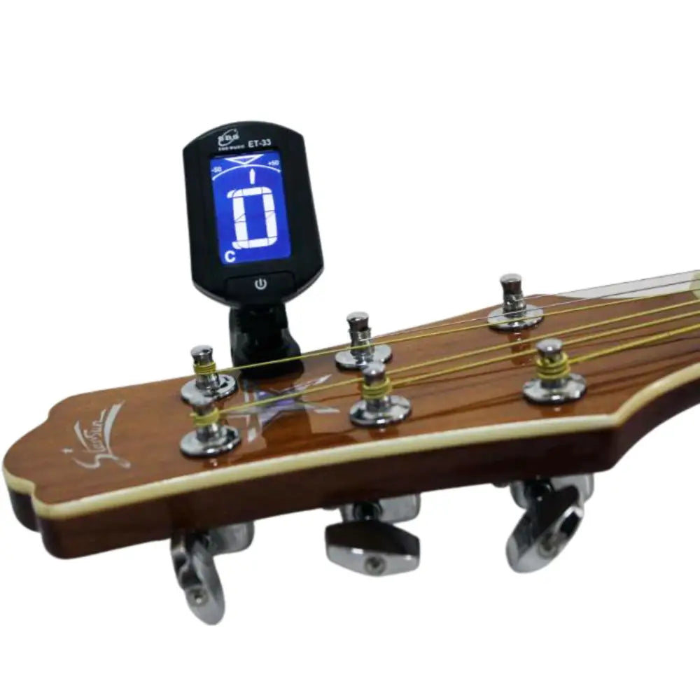Axiom Clip On Tuner, a handy clip on guitar tuner for quick tuning on your guitar