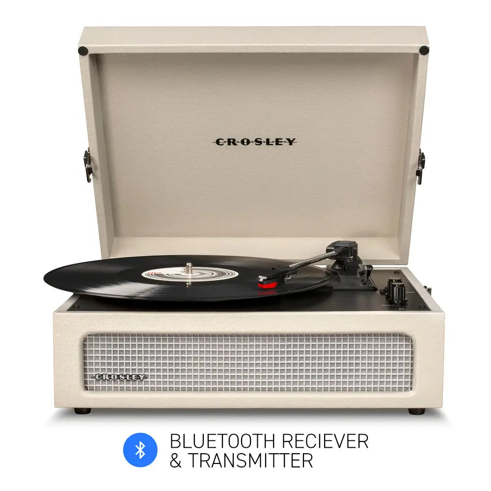 Cream-colored Crosley Voyager Dune Bluetooth portable turntable with built-in Bluetooth speakers