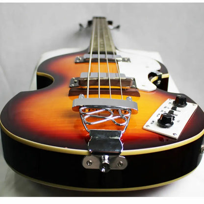 Axiom Cavern Beatle Bass hollow-body bass guitar with sunburst finish and trapeze tailpiece