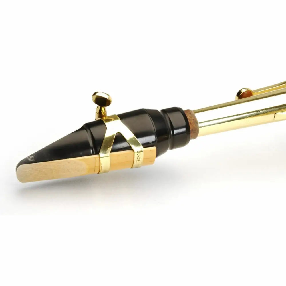 Black saxophone mouthpiece with gold ligature and light brown reed for Axiom Concerto Series Alto Saxophone