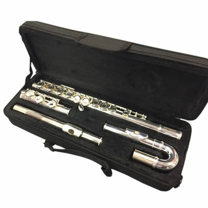 Silver-colored curved head flute disassembled in black case, perfect flute for young players