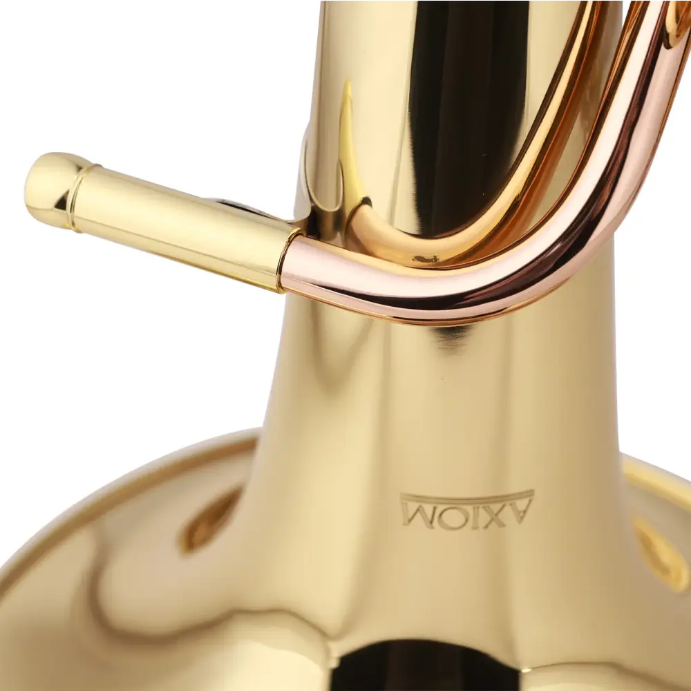 Gold-colored brass axiom student baritone horn with polished finish and brand engraving on its body
