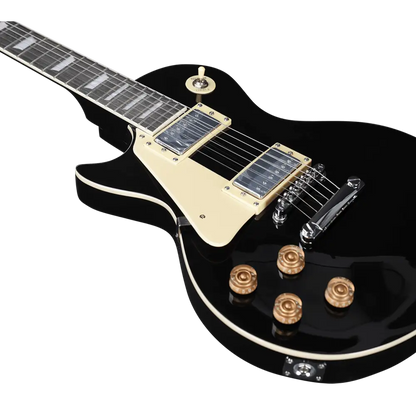 Left handed black electric guitar with cream pickguard and gold control knobs