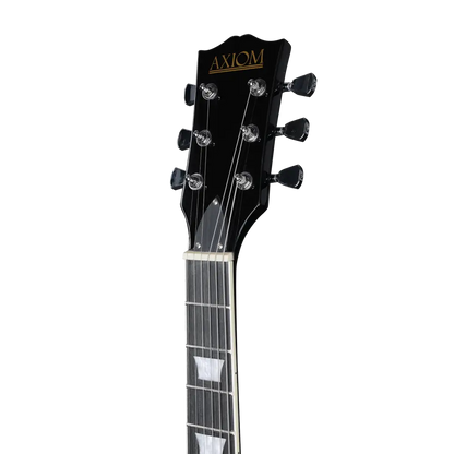 Left handed electric guitar headstock with gold AXIOM branding and chrome tuning pegs
