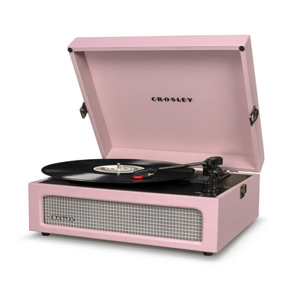Pink Crosley Voyager Amethyst portable turntable with black vinyl and built-in Bluetooth