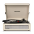 Cream-colored Crosley Voyager Dune Bluetooth portable turntable with black vinyl record