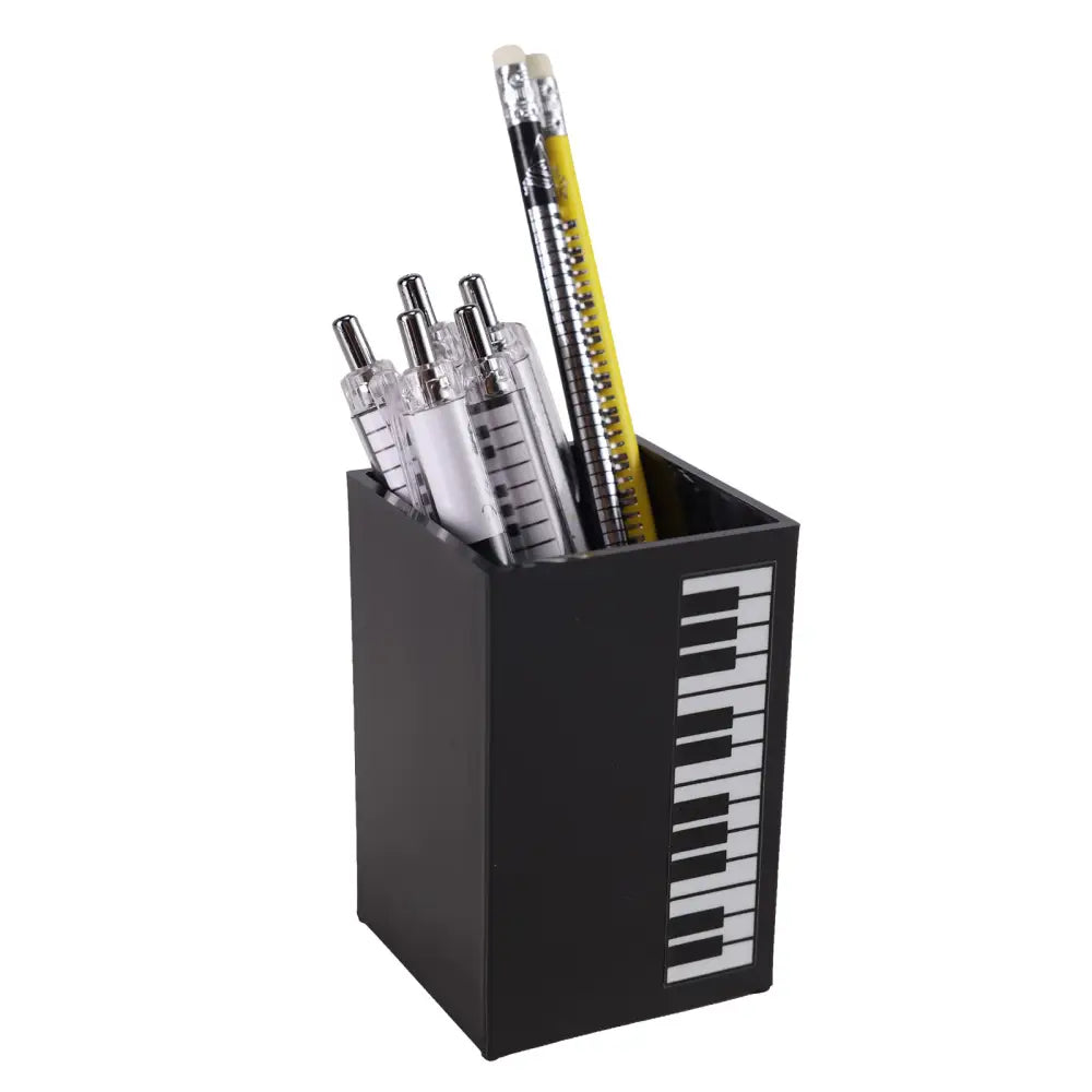Black rectangular pen holder with white piano keyboard design perfect as a piano keyboard pen giftware