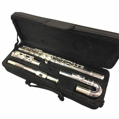 The Axiom Prelude Curved Head Flute Outfit by Axiom Music is shown disassembled in a black open case, highlighting quality craftsmanship and USA-made pads.